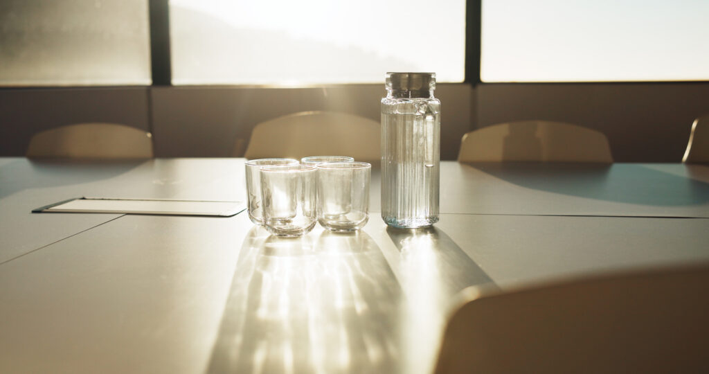 Sunlit modern corporate boardroom representing private company and family trust division in NSW family law